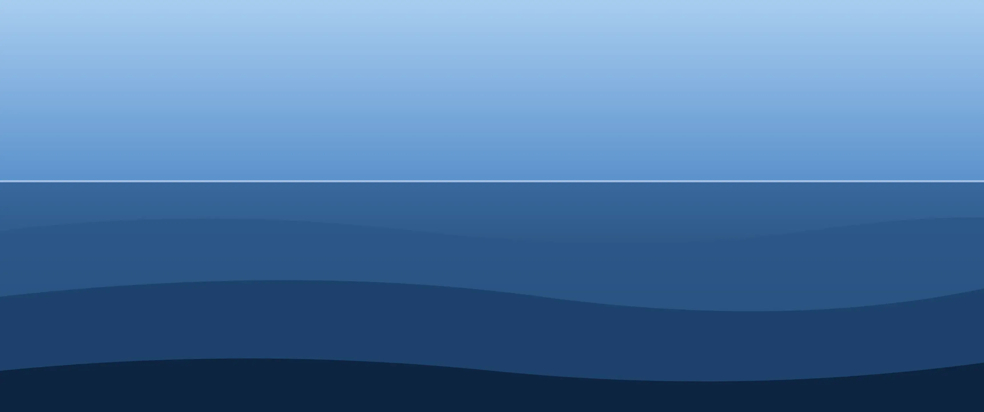 Ultrawide wallpaper of deep blue ocean swells under a clear horizon